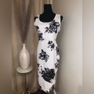 White dress with black floral pattern